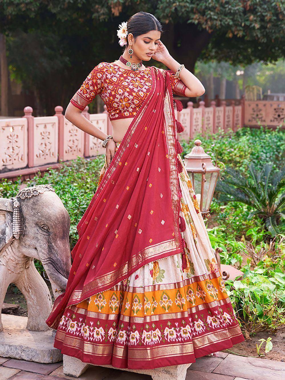 Red and cream printed lehenga choli with floral blouse, perfect for Indian ethnic occasions