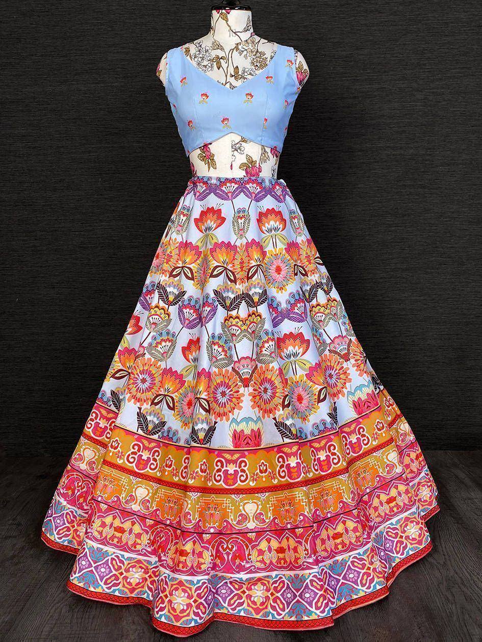 Vibrant floral print lehenga choli with blue blouse, perfect for Indian ethnic wear