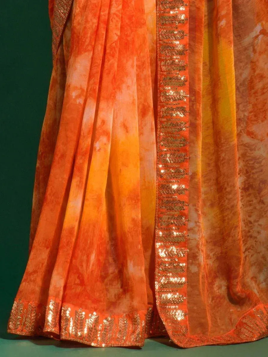 Orange tie-dye lehenga with gold sequin border, ethnic wear for women
