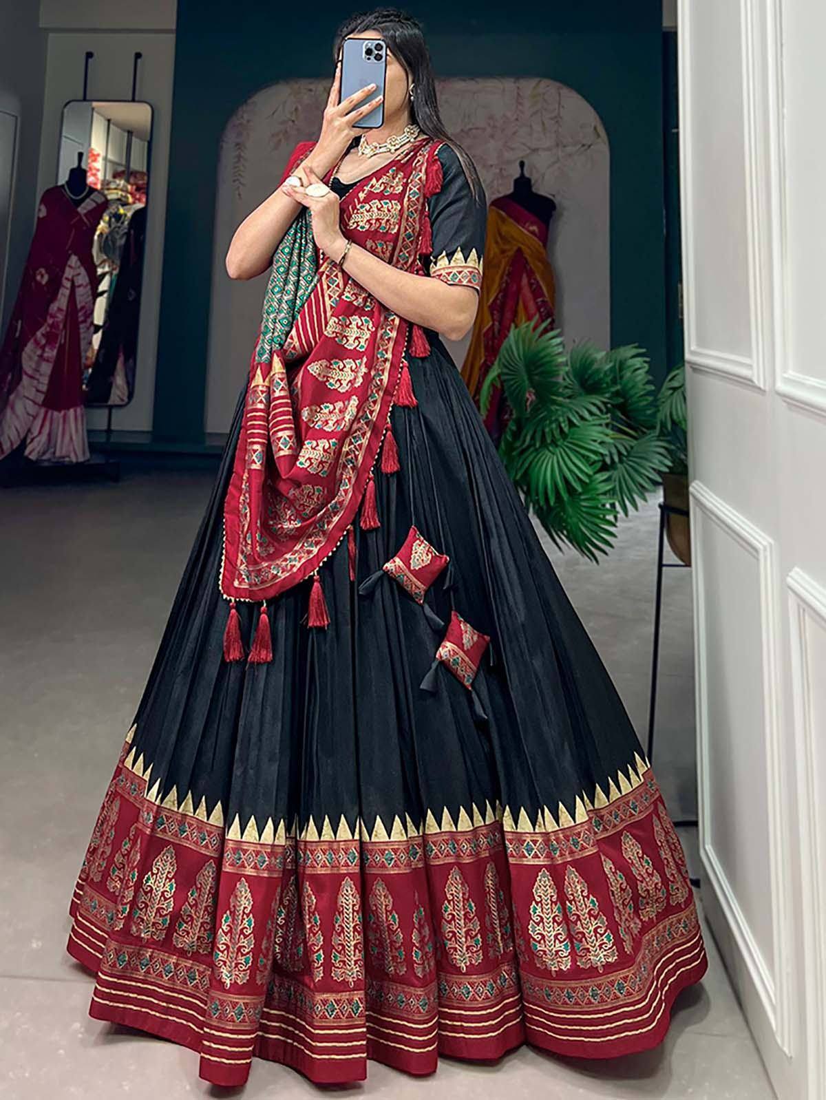 Black and red embroidered lehenga choli with tassels, perfect for Indian ethnic wear occasions