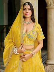 Pretty Yellow Embroidered Crush Wedding Wear Lehenga Choli