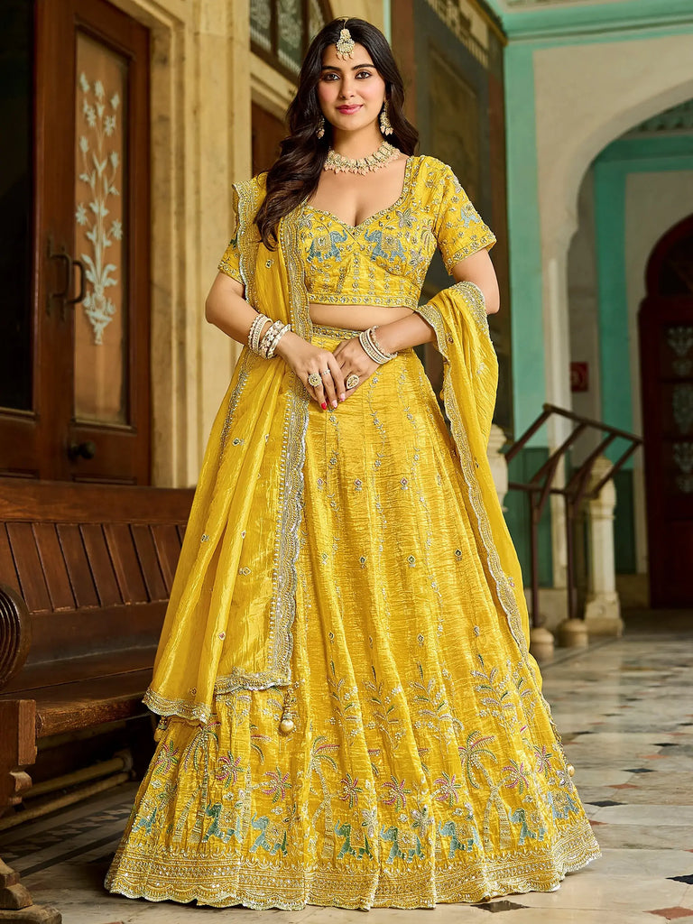 Pretty Yellow Embroidered Crush Wedding Wear Lehenga Choli