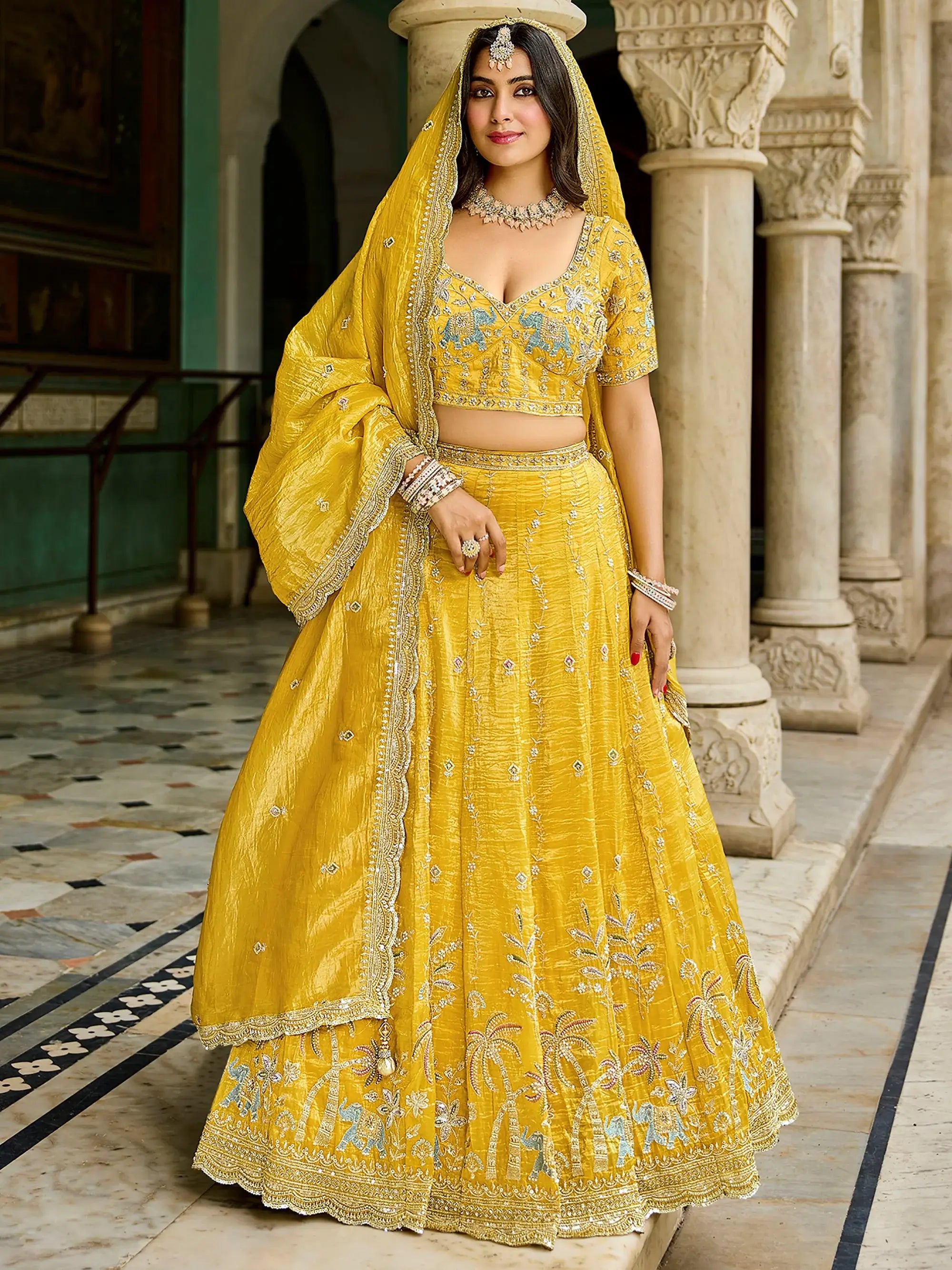 Pretty Yellow Embroidered Crush Wedding Wear Lehenga Choli