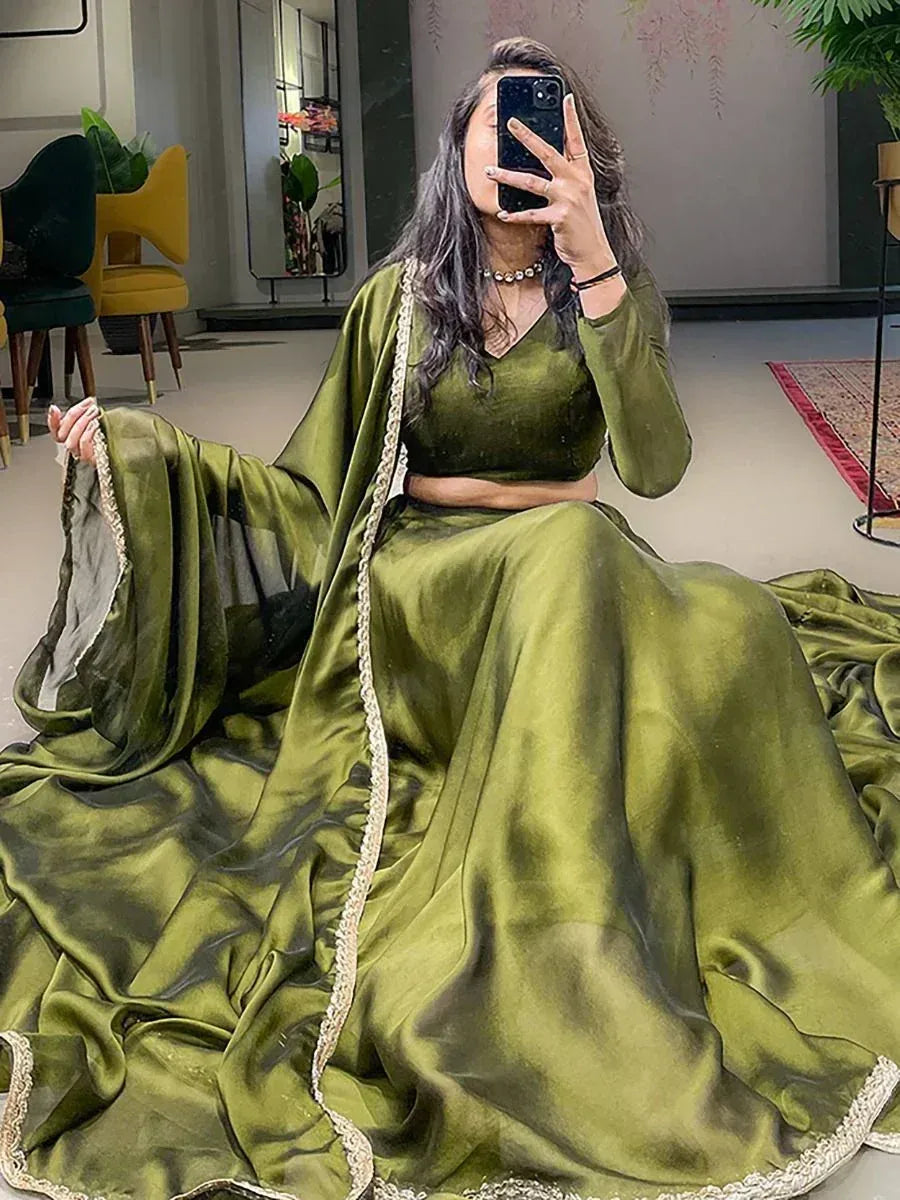 Olive green velvet lehenga choli with gold trim, perfect for Indian ethnic wear occasions