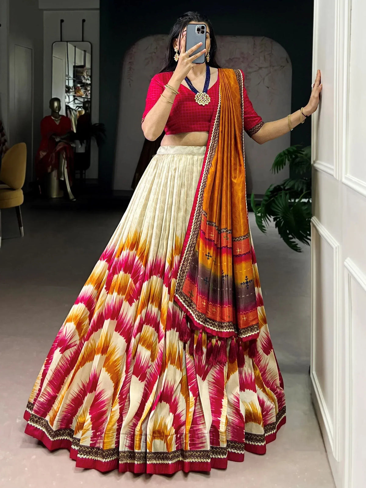 Vibrant ethnic lehenga choli with ikat print, perfect for festive occasions and traditional events.