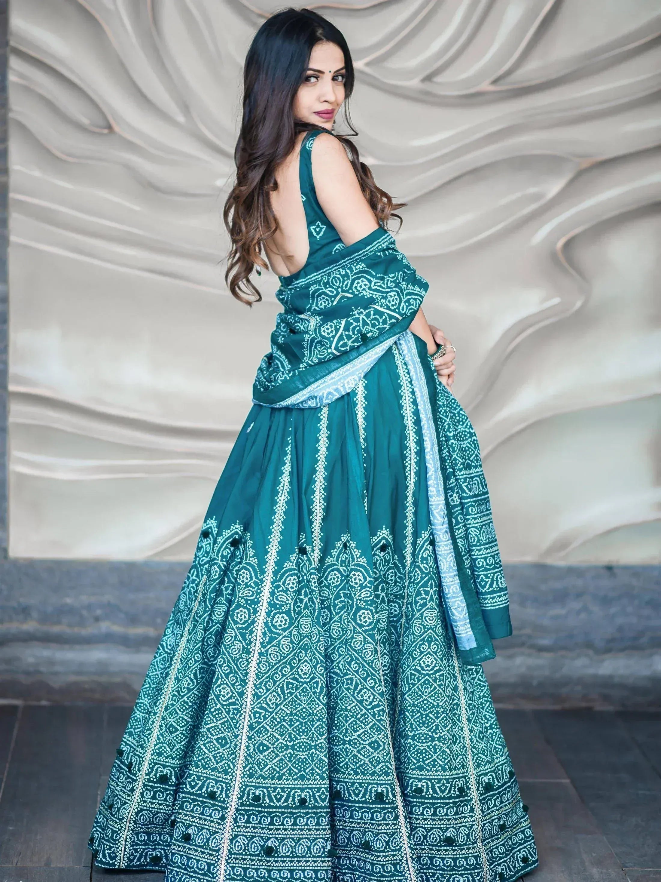 Teal green printed lehenga choli with white embroidery, ethnic Indian wear for women