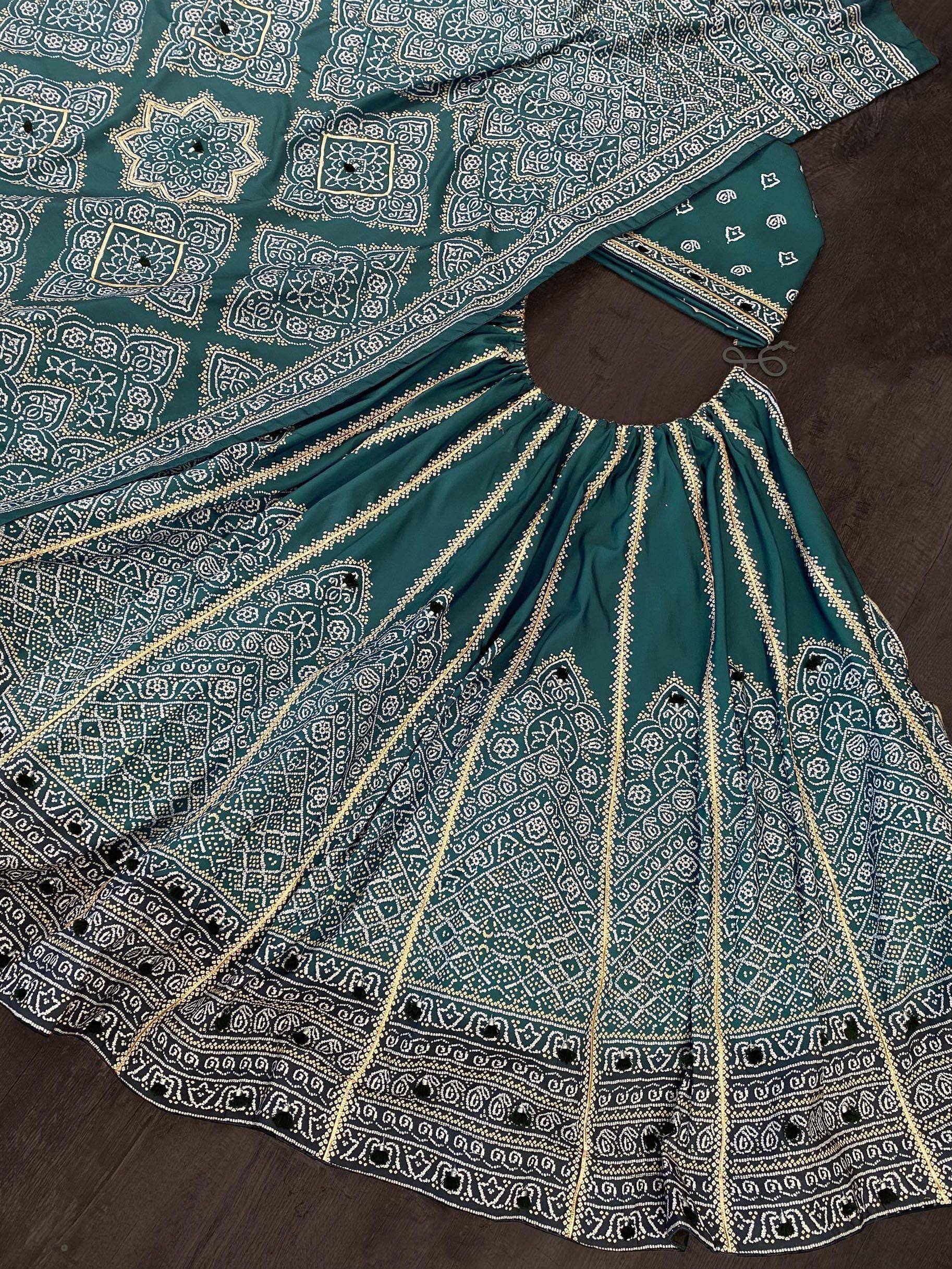 Emerald green ethnic lehenga choli with white and gold block print patterns, perfect for Indian festivals and weddings.