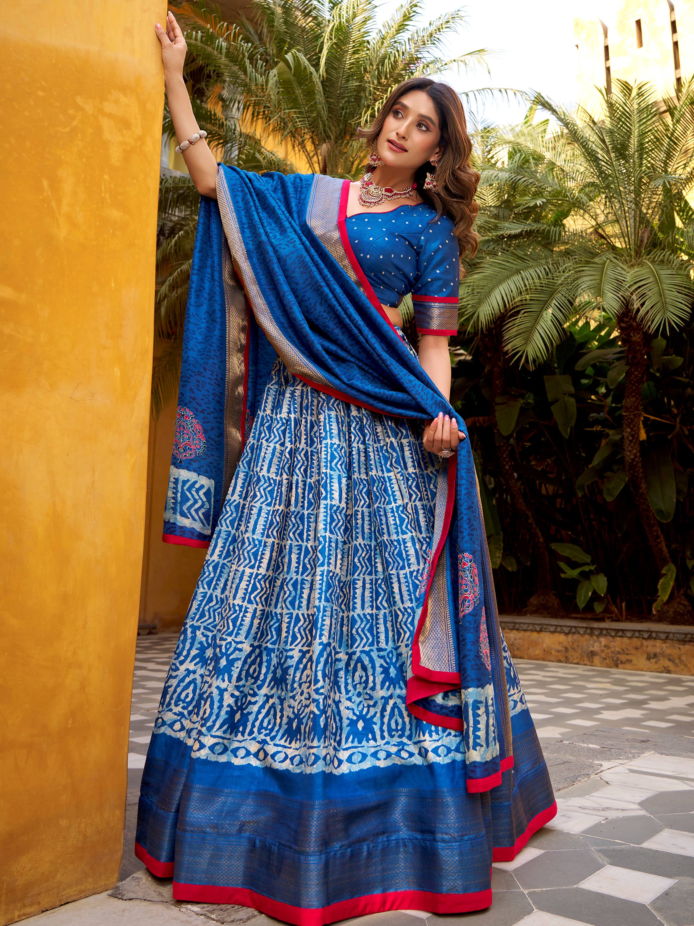 Outstanding Blue Printed Dola Silk Wedding Lehenga Choli