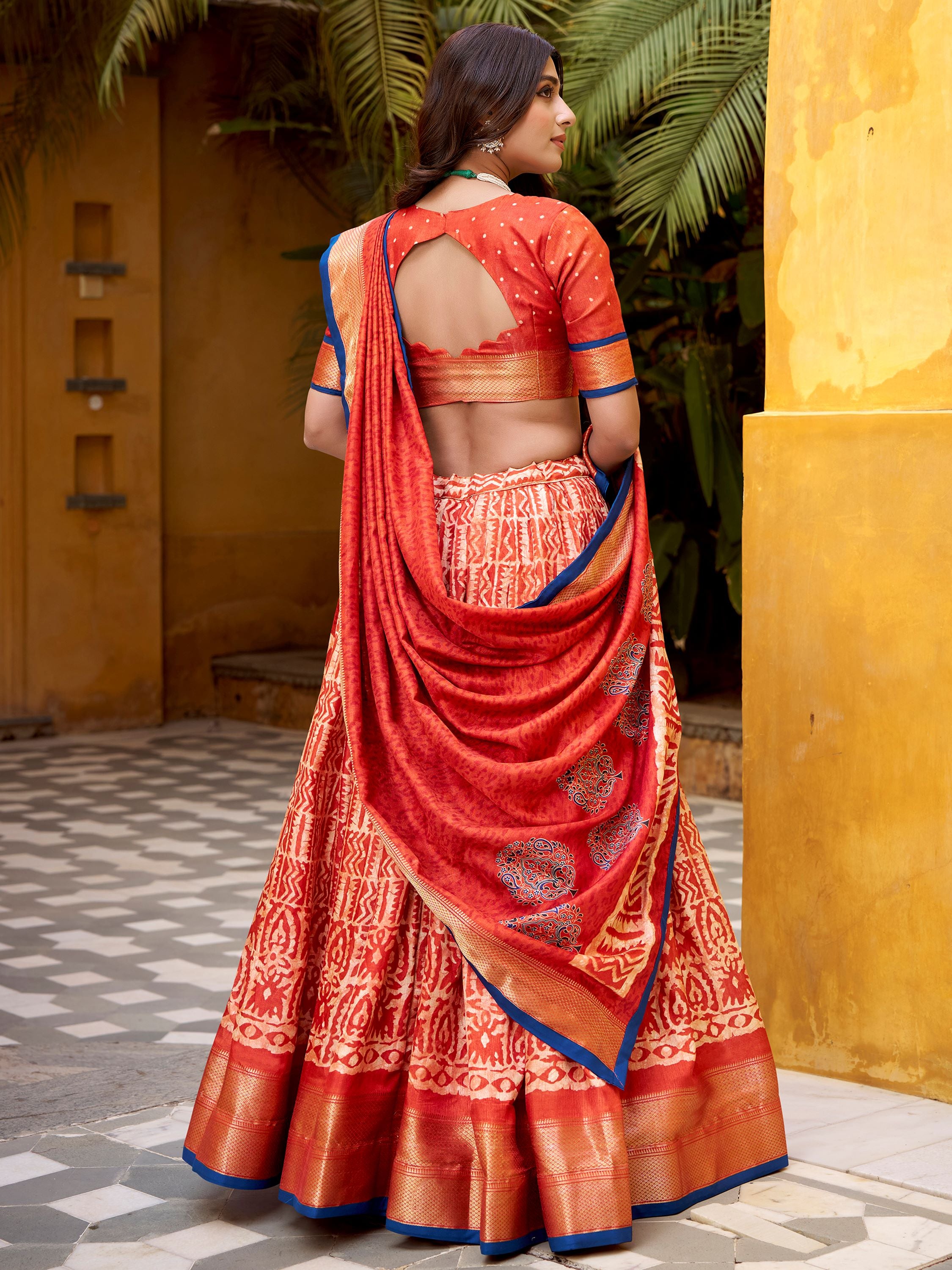 Enchanting Orange Printed Dola Silk Function Wear Lehenga Choli