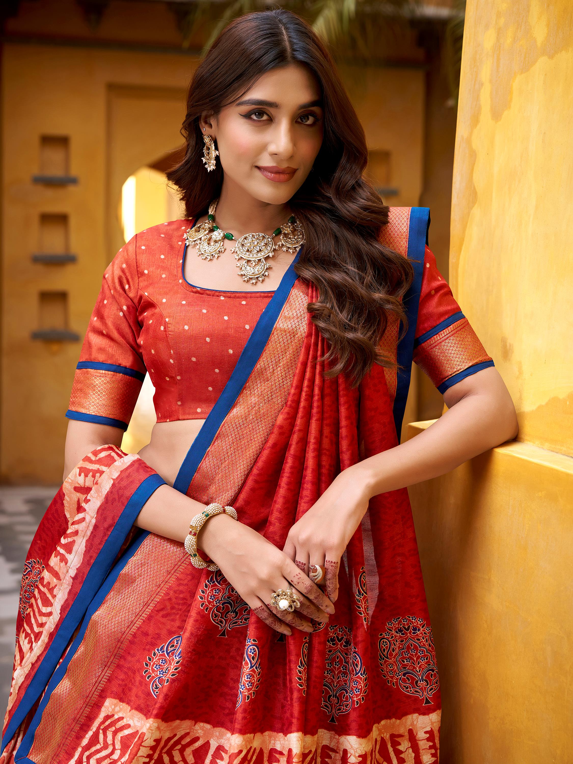 Enchanting Orange Printed Dola Silk Function Wear Lehenga Choli