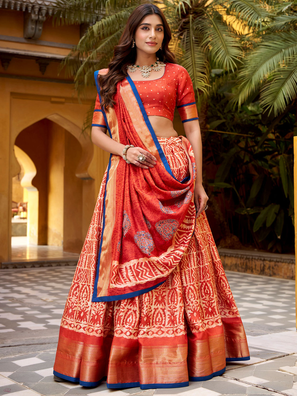 Enchanting Orange Printed Dola Silk Function Wear Lehenga Choli