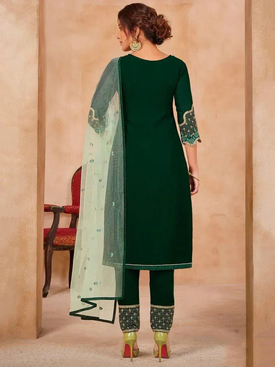 Emerald green designer salwar kameez with embroidered sleeves and dupatta, perfect for ethnic occasions