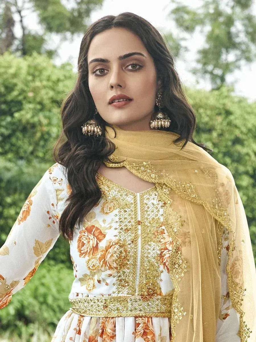 Elegant floral printed salwar kameez with golden embroidery and dupatta for ethnic wear