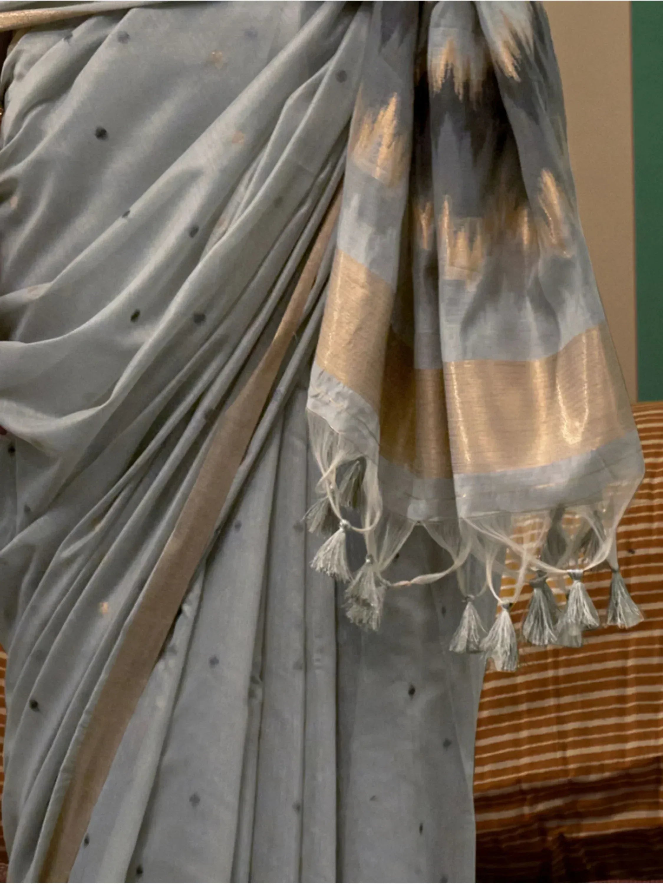 Grey saree with gold border and tassels, Indian ethnic wear