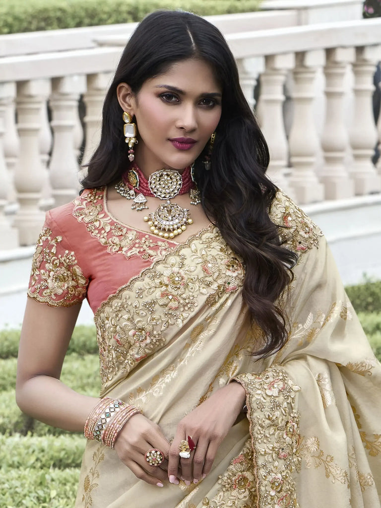 Gorgeous Beige Heavy Border Work Organza Silk Reception Wear Saree