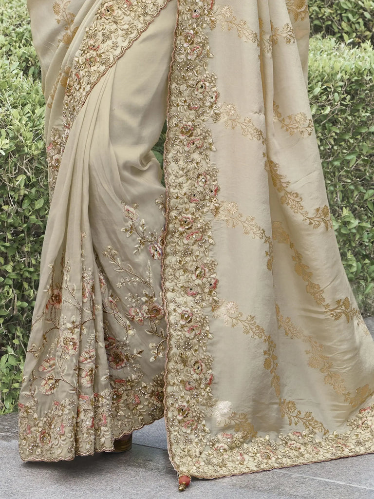 Gorgeous Beige Heavy Border Work Organza Silk Reception Wear Saree