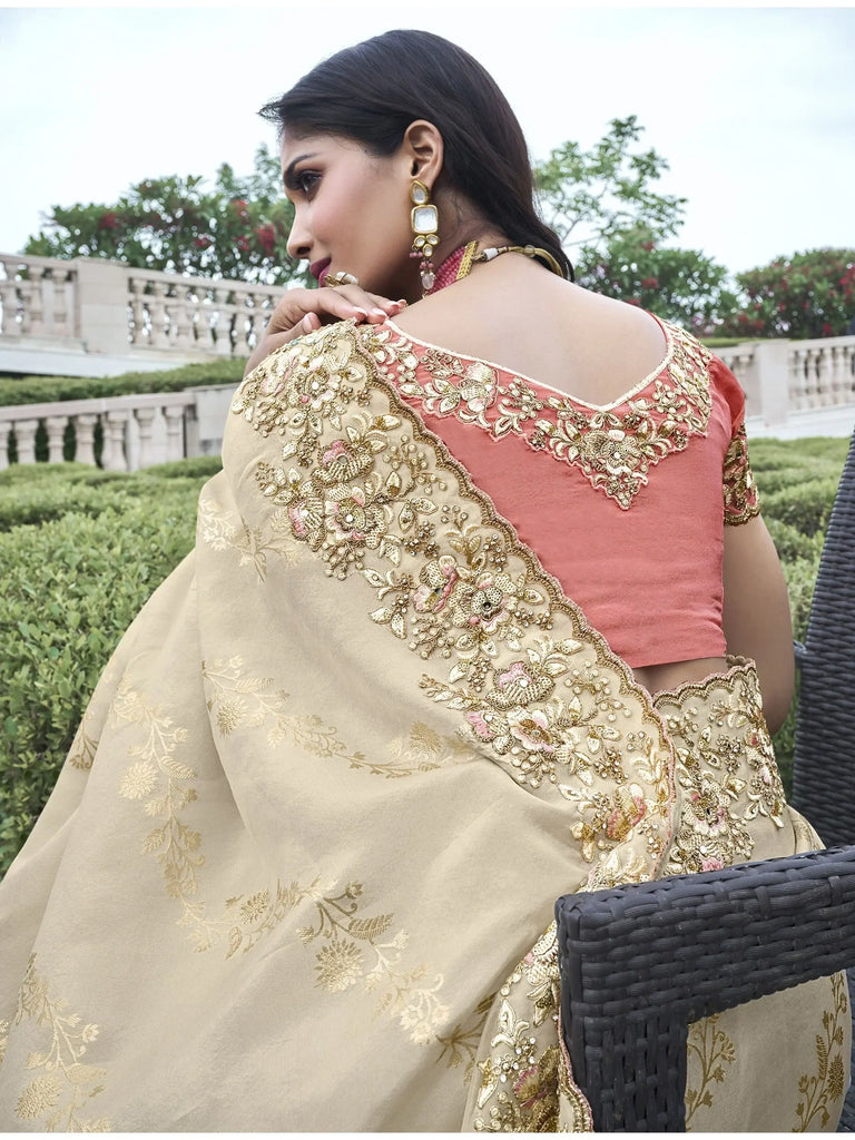 Gorgeous Beige Heavy Border Work Organza Silk Reception Wear Saree