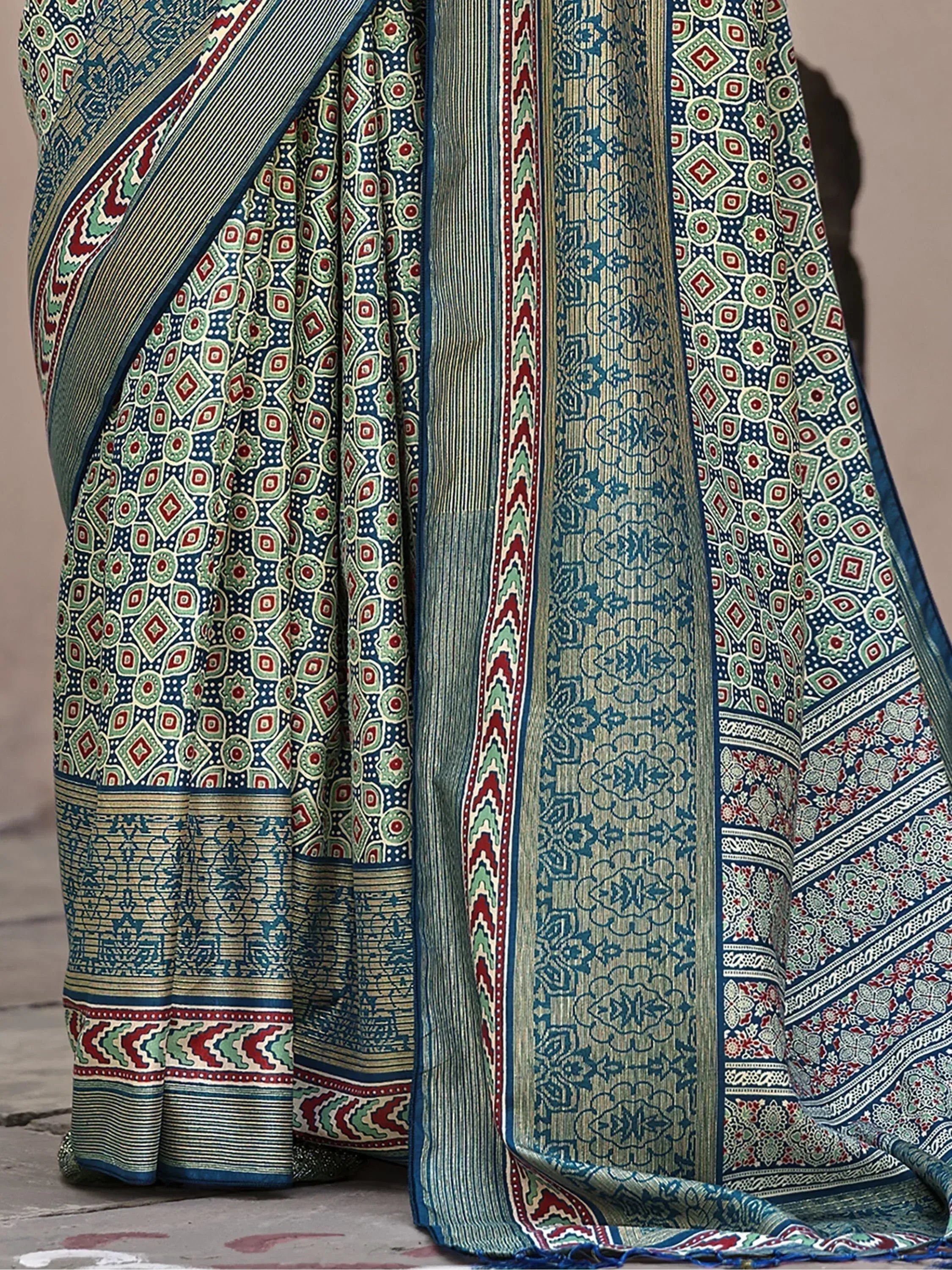 Blue green printed saree with intricate geometric and floral patterns, ethnic Indian wear