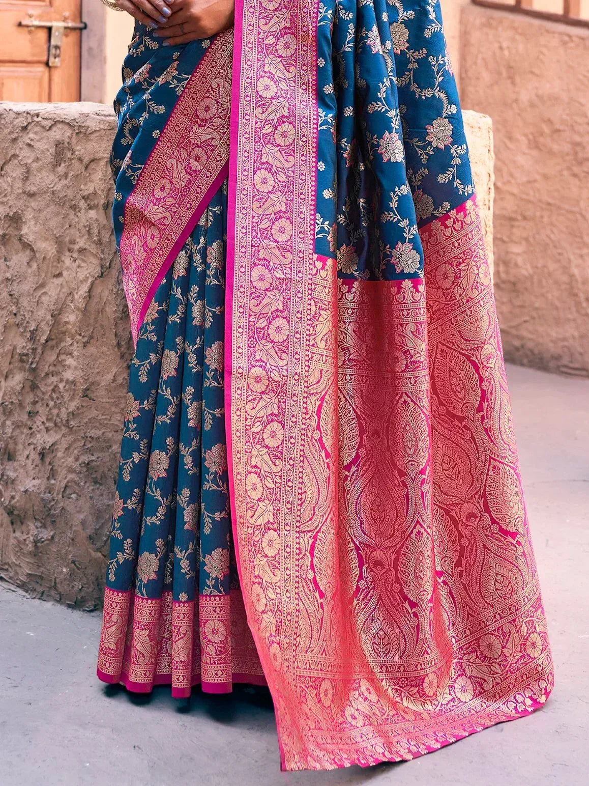 Teal and pink floral saree with gold zari work, perfect for Indian ethnic wear occasions