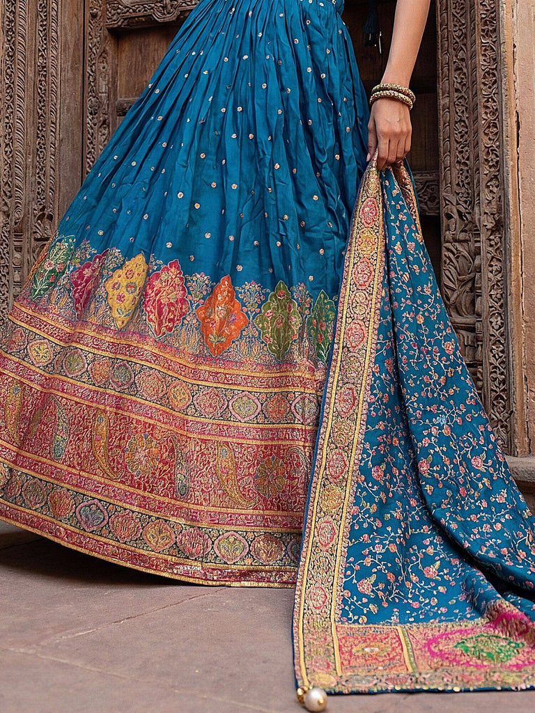 Fabulous Teal Blue Zari Weaving Silk Reception Wear Lehenga Choli