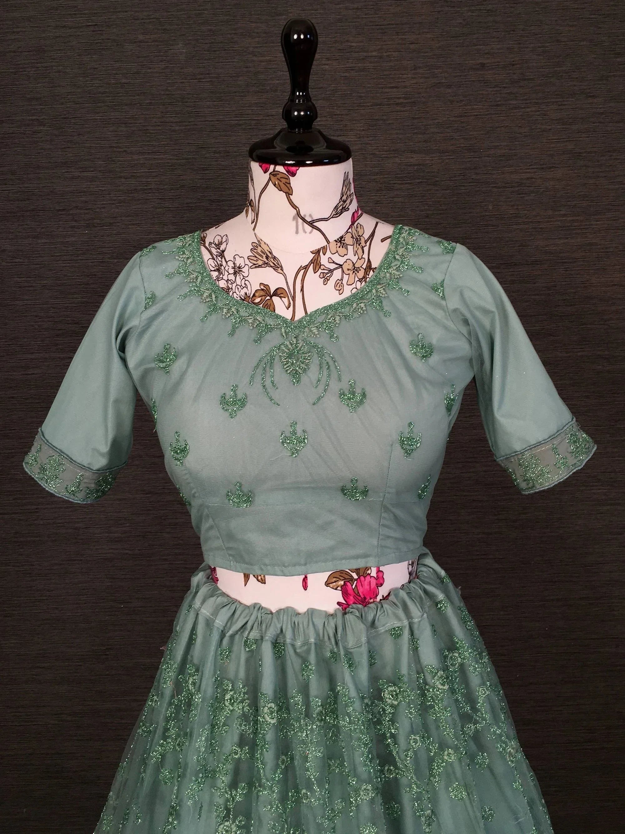 Pretty Pista Green Net Floral Embroidered Traditional Lehenga Choli