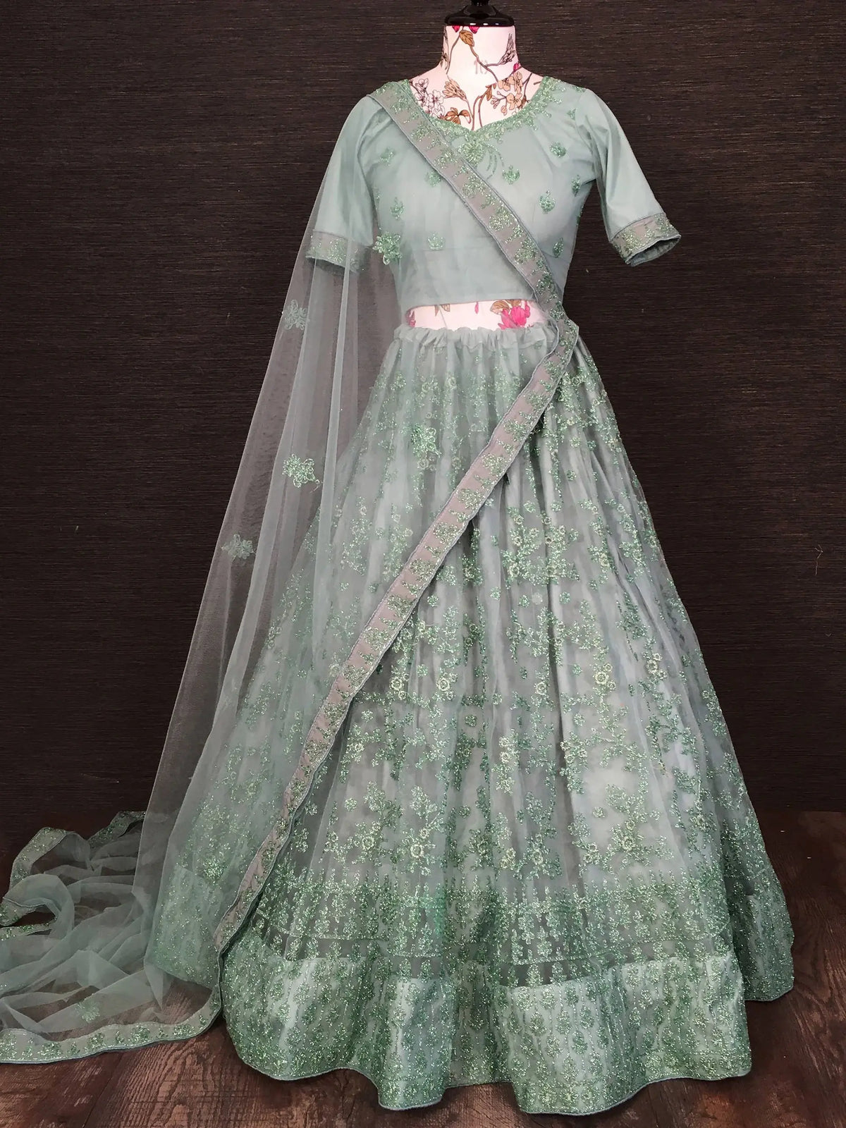 Pretty Pista Green Net Floral Embroidered Traditional Lehenga Choli