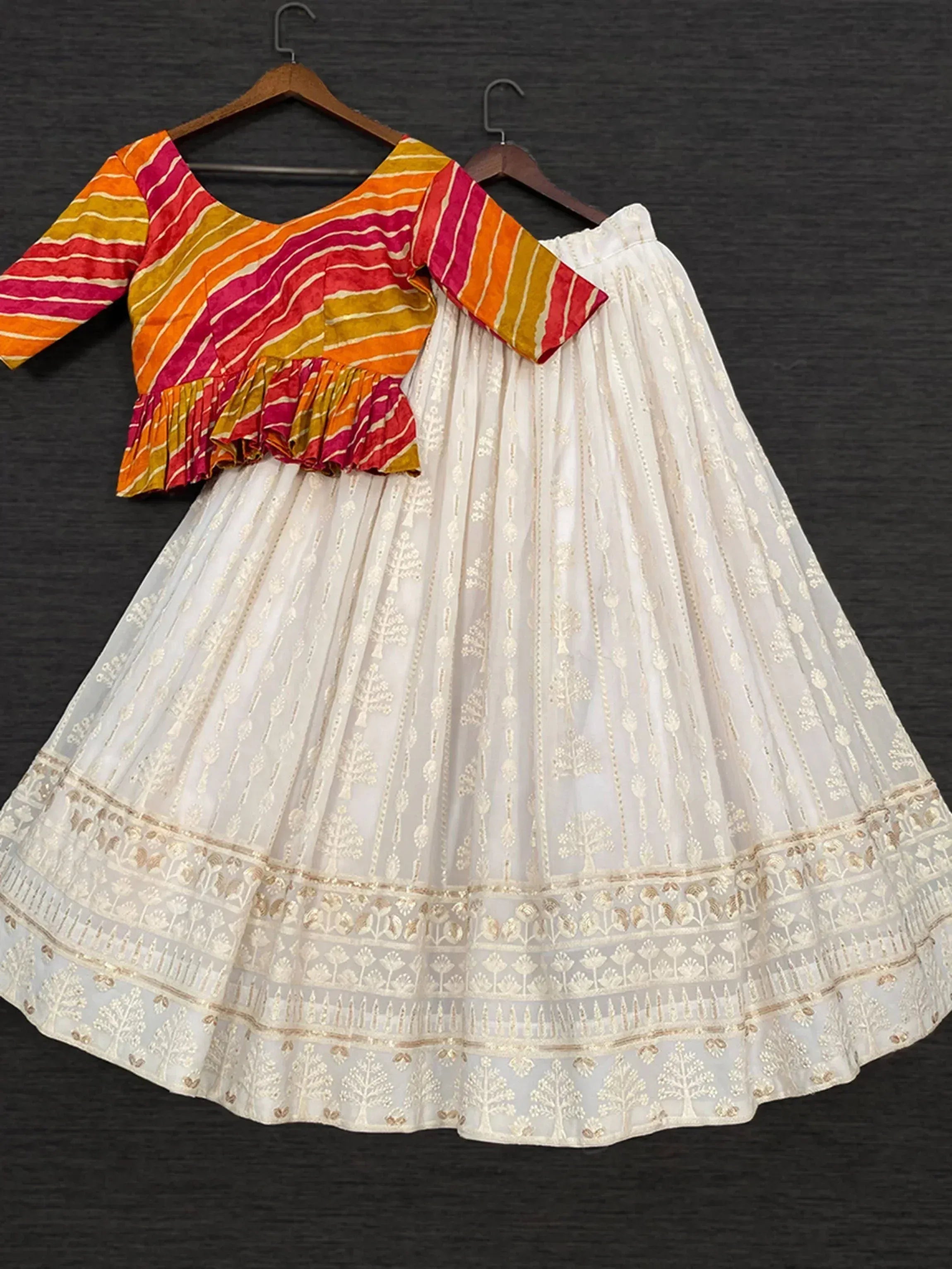White embroidered lehenga with colorful striped blouse, Indian ethnic wear