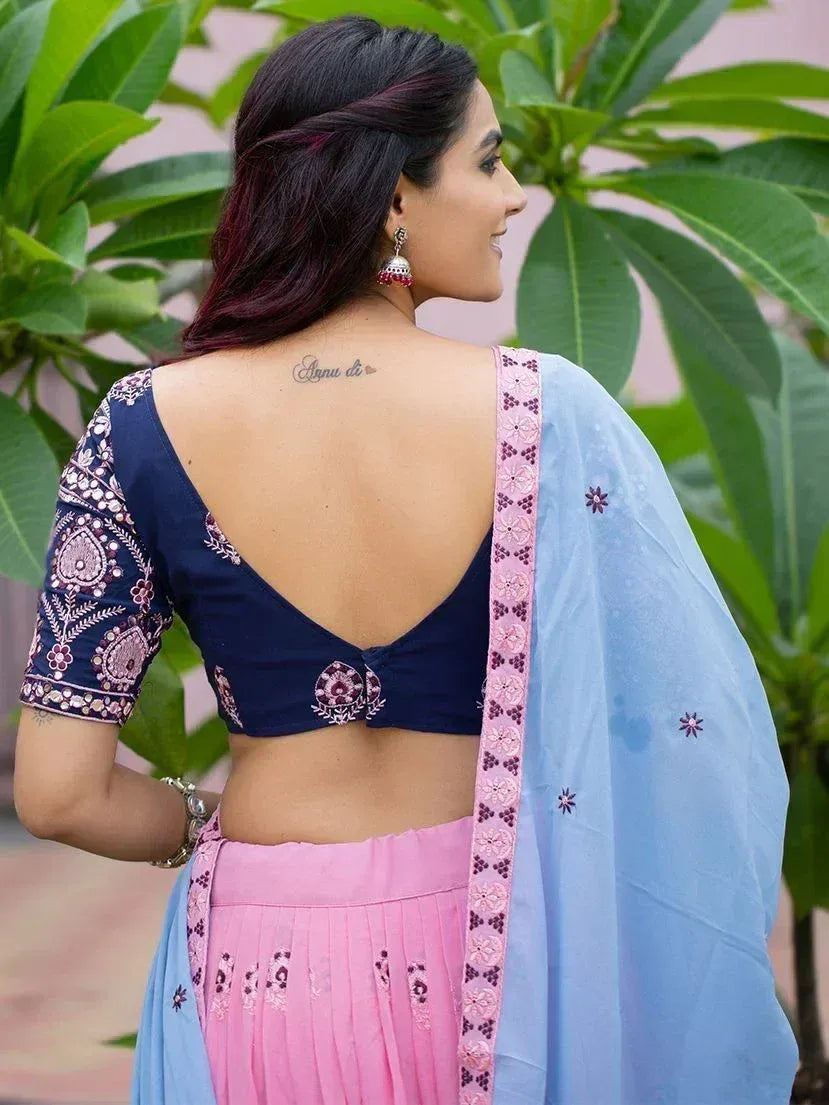 Navy blue embroidered blouse with pink lehenga and light blue dupatta, ethnic Indian wear