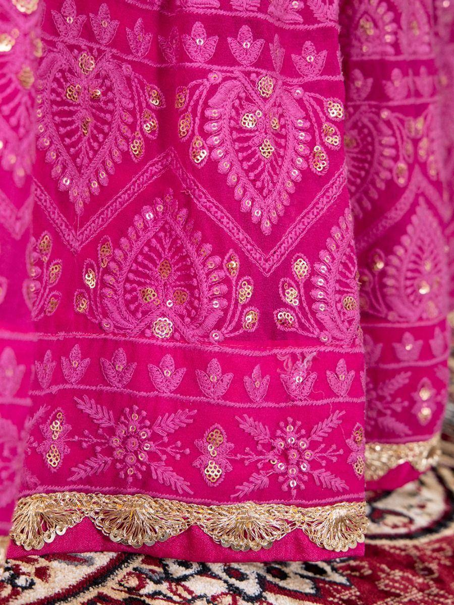 Fuchsia ethnic wear with gold embroidery and sequin detailing, perfect for Indian festivities