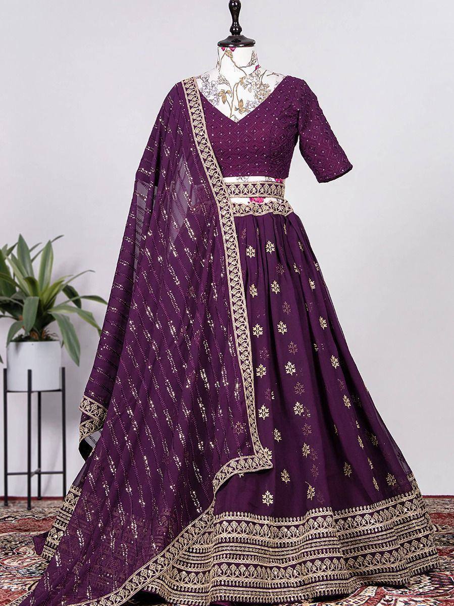 Purple embroidered lehenga choli with gold detailing, perfect for Indian ethnic wear occasions