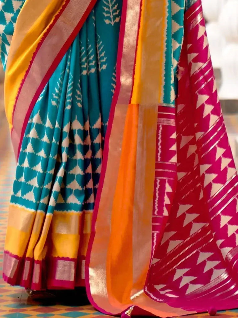 Gorgeous Sky Blue & Pink Patola Printed Silk Wedding Saree With Blouse