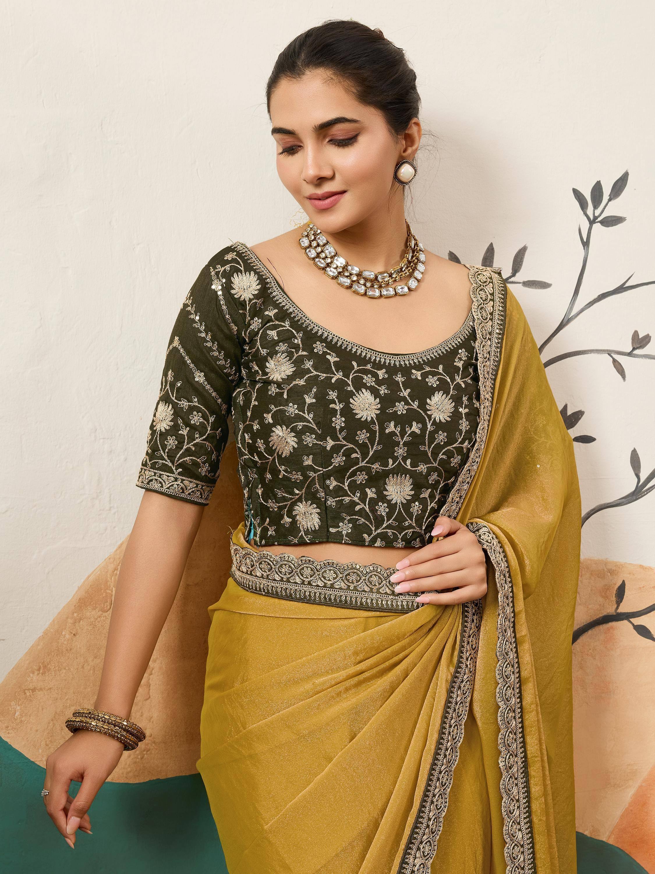 Lovely Yellow Silk Festive Wear Saree With Heavy Embroidered Blouse