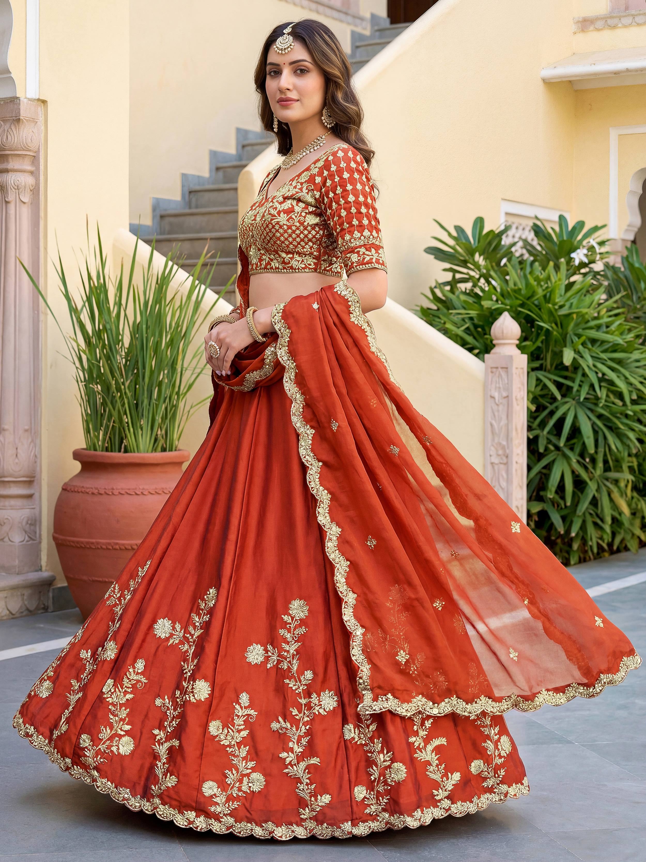 Captivating Orange Thread Embroidered Silk Wedding Wear Lehenga Choli