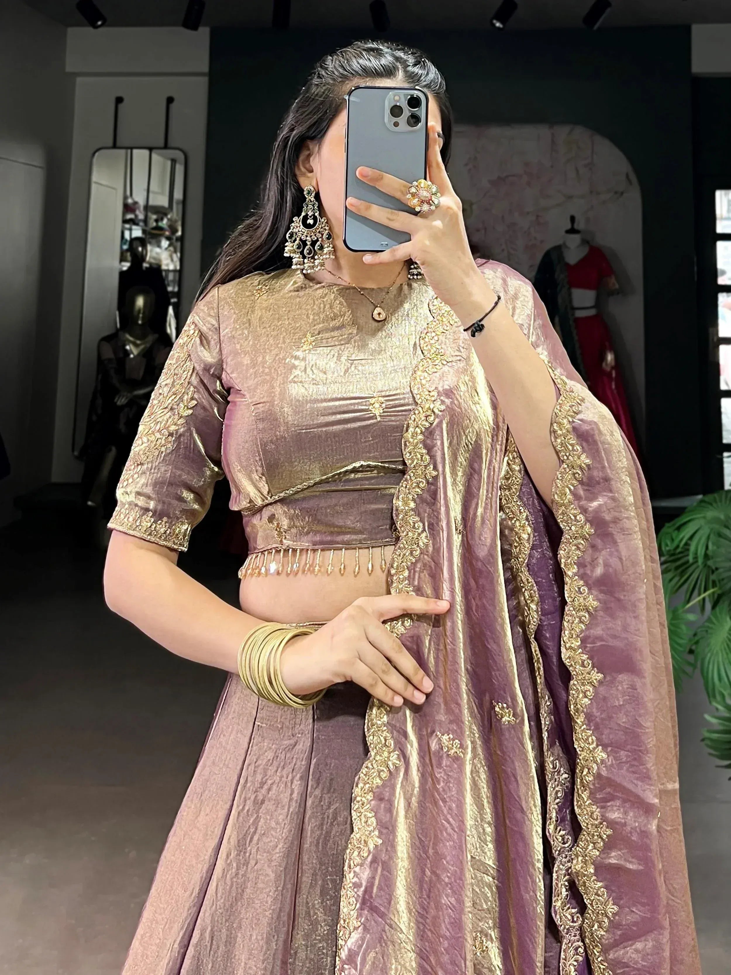 Elegant mauve lehenga choli with gold embroidery, perfect for Indian ethnic wear occasions