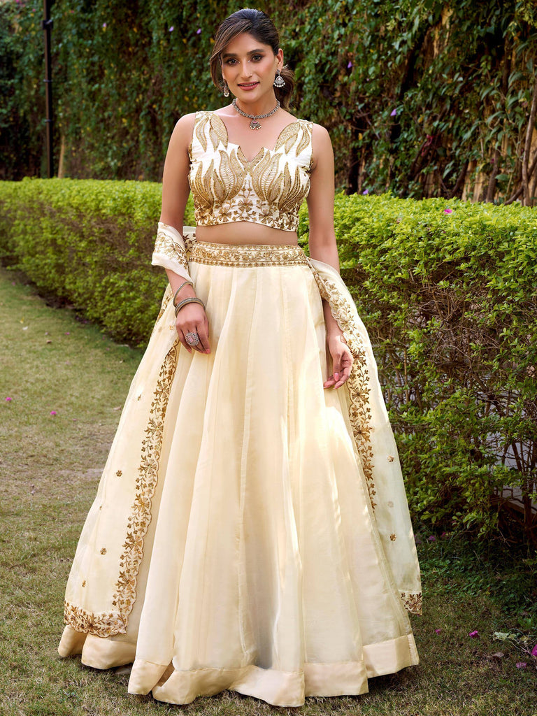 Incredible Off-White Embroidered Silk Wedding Wear Lehenga Choli