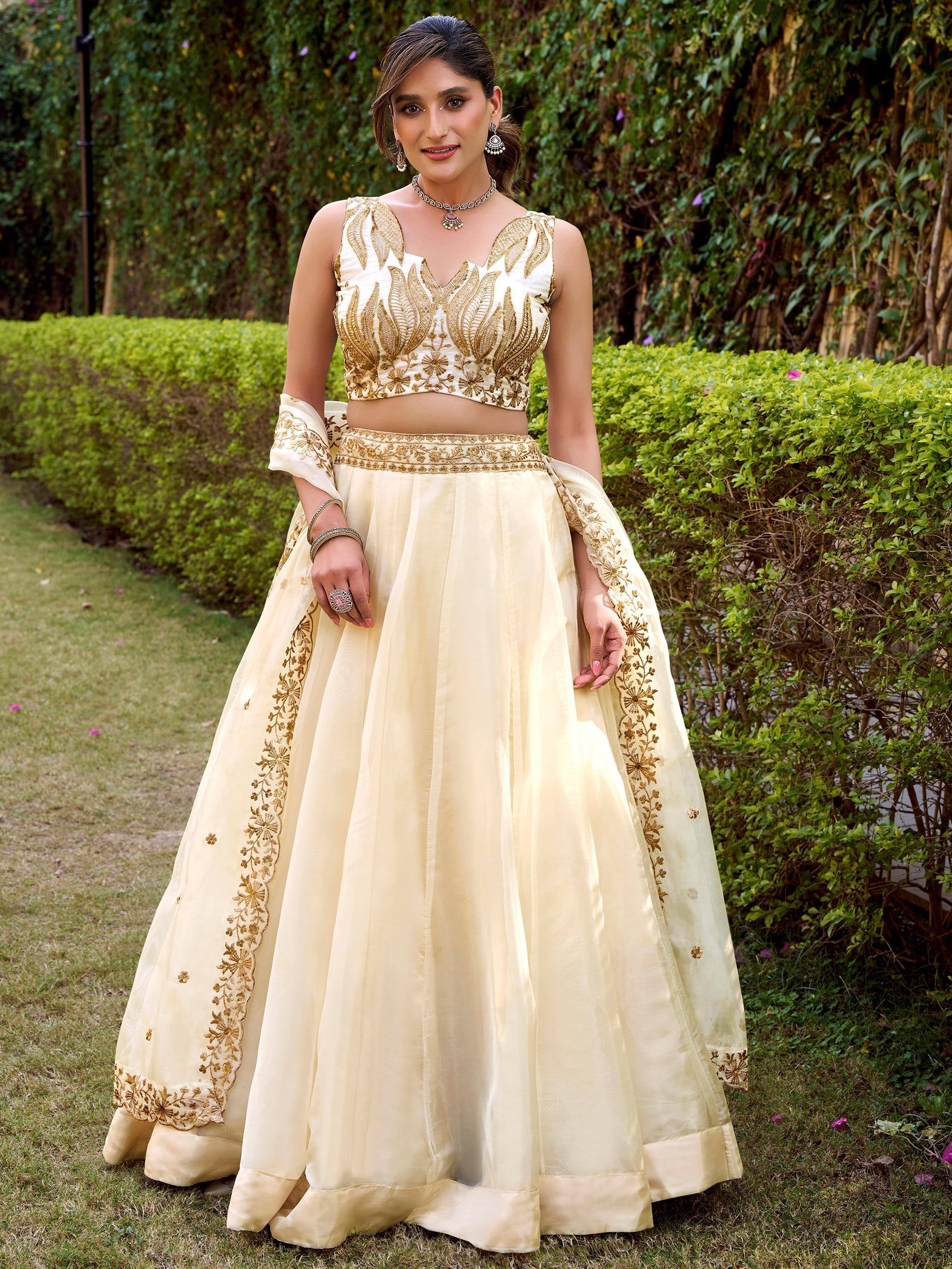 Incredible Off-White Embroidered Silk Wedding Wear Lehenga Choli