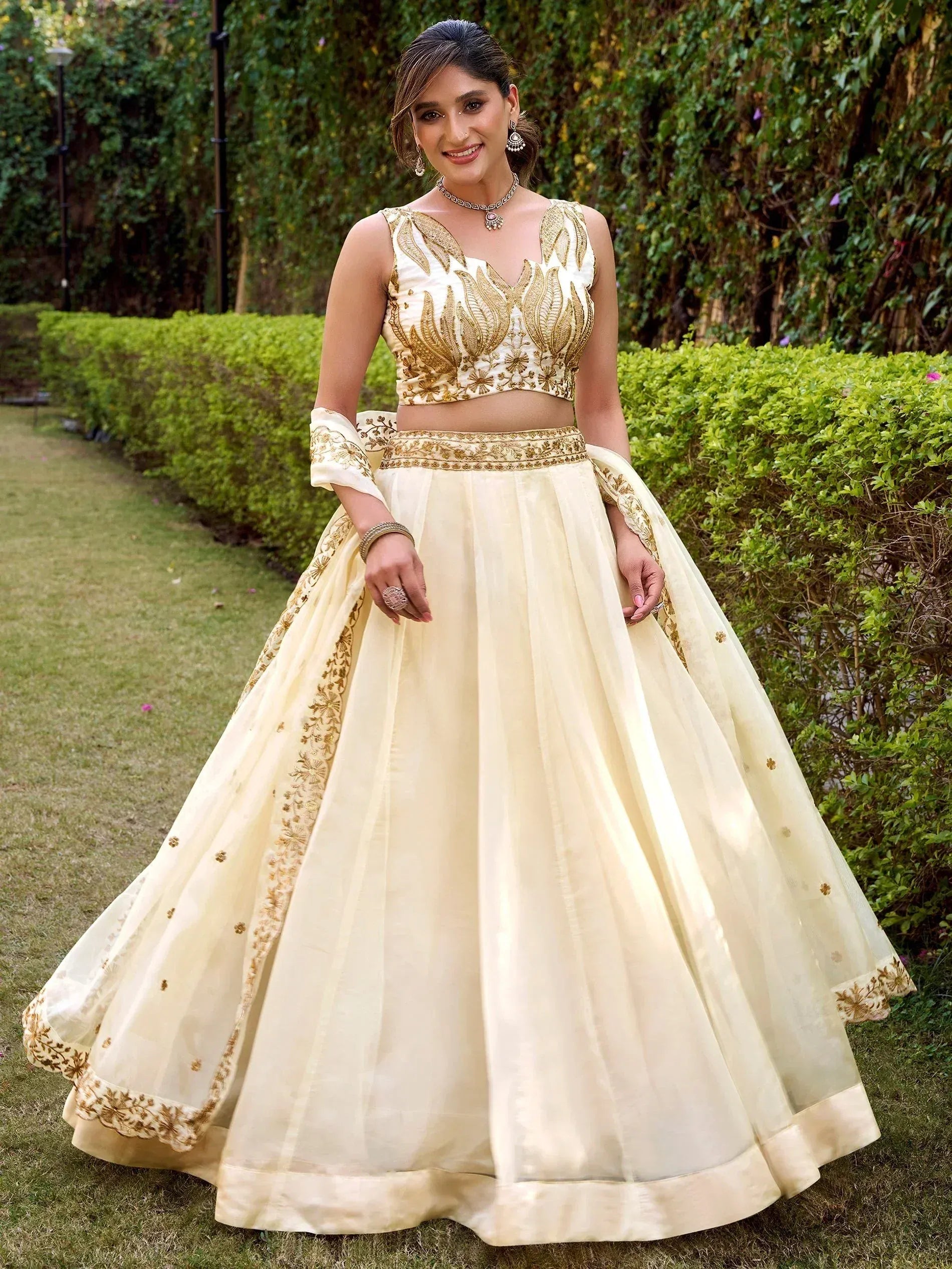 Incredible Off-White Embroidered Silk Wedding Wear Lehenga Choli