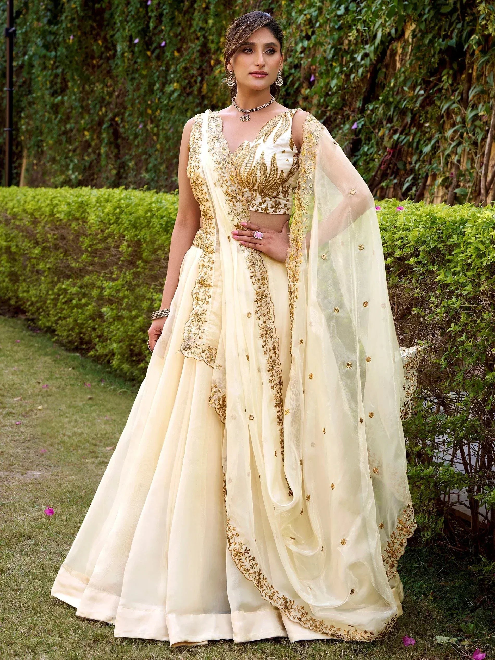 Incredible Off-White Embroidered Silk Wedding Wear Lehenga Choli