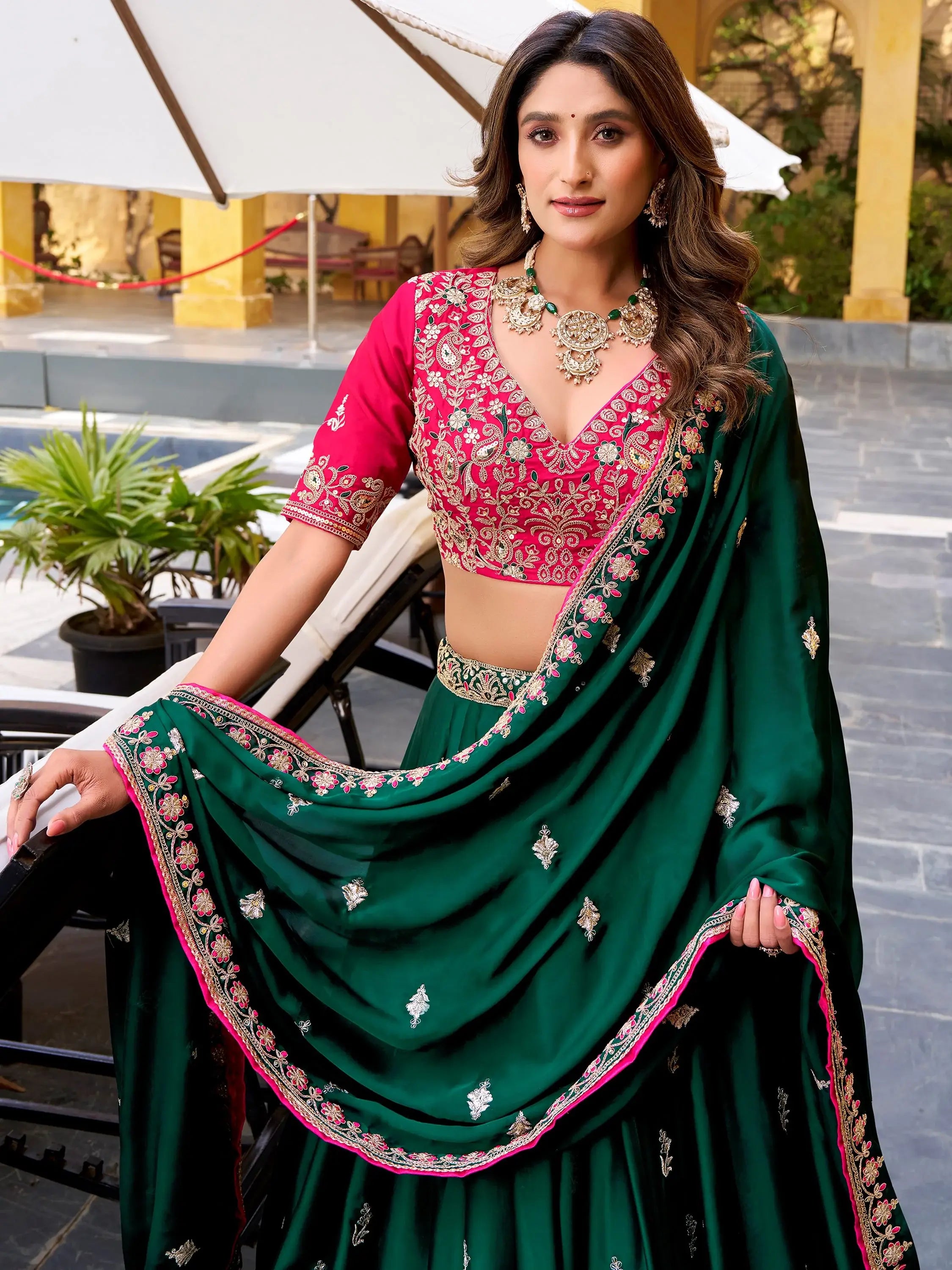 Glamorous Green Embroidered Silk Wedding Wear Lehenga Choli