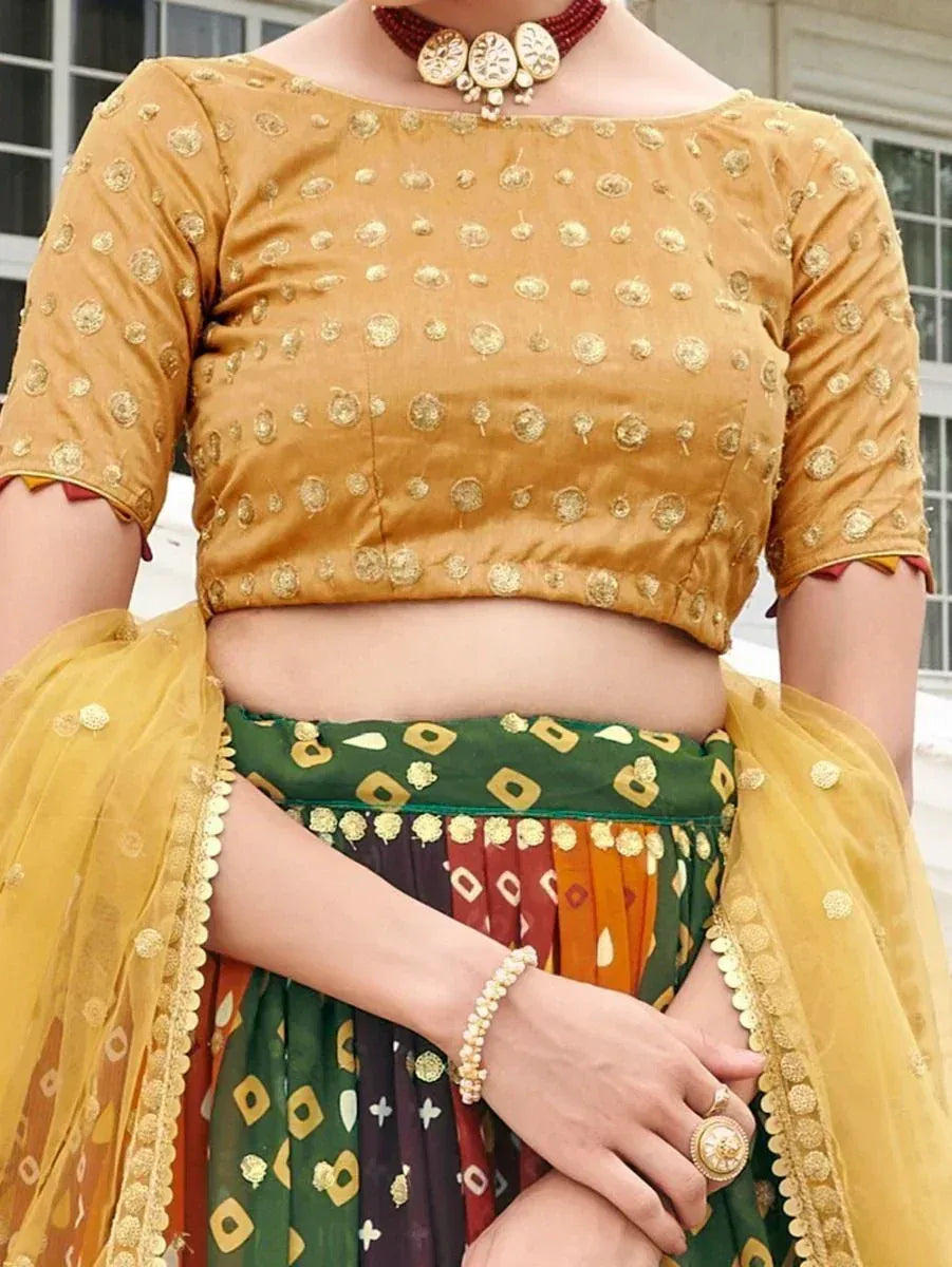 Mustard yellow embroidered crop top with colorful lehenga, perfect for Indian ethnic wear occasions