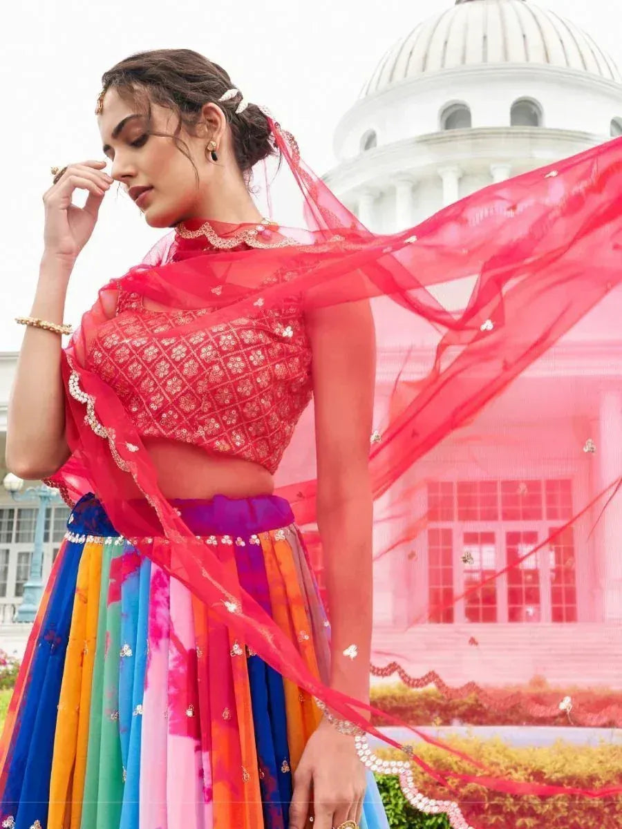 Vibrant multicolor lehenga choli with red dupatta, perfect for Indian ethnic occasions and festive wear.