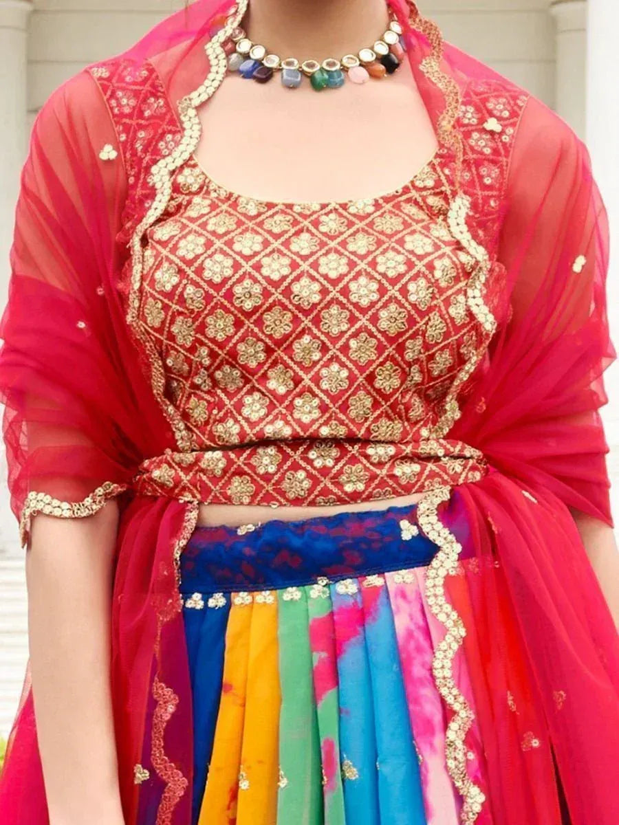 Red embroidered lehenga choli with colorful skirt and dupatta, perfect for Indian ethnic wear occasions