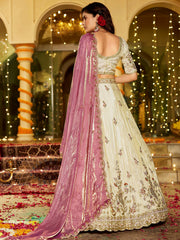 Impressive Beige Embroidered Tissue Engagement Wear Lehenga Choli 