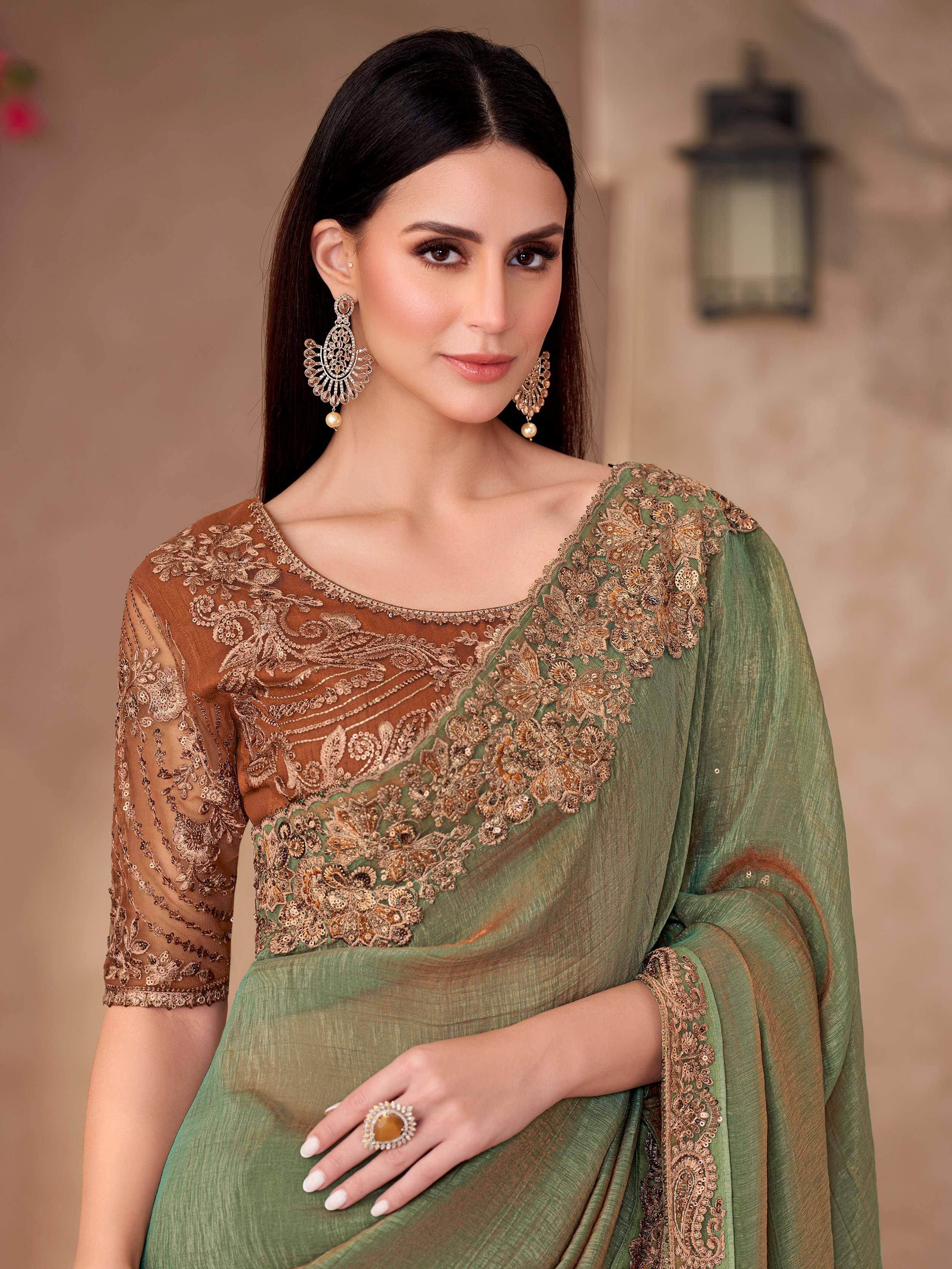 Elegant green saree with gold embroidery, perfect for Indian ethnic wear and festive occasions.