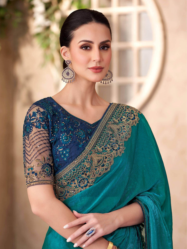 Mesmerizing Teal Blue Georgette Border Work Festival Wear Saree