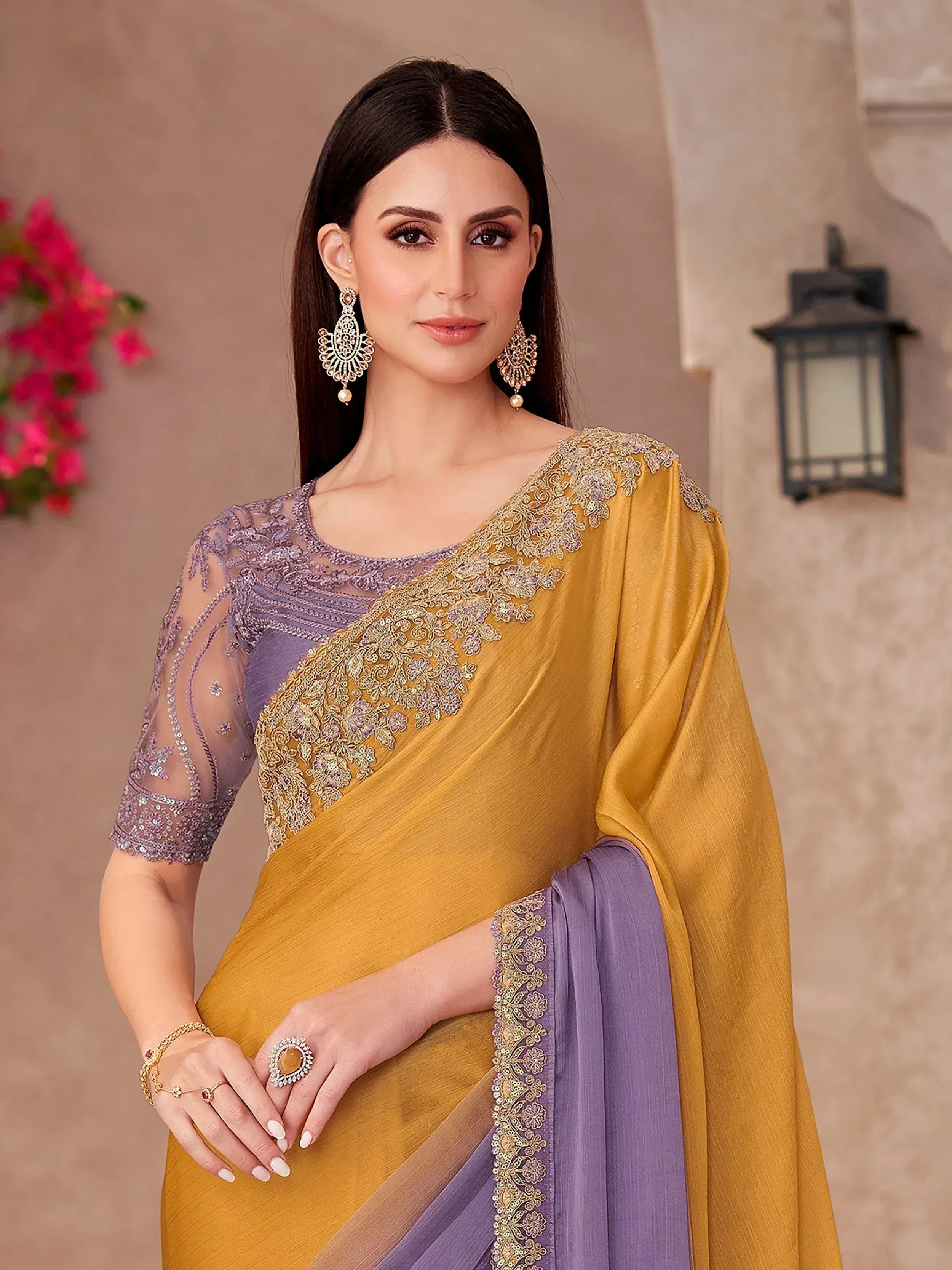 Elegant mustard and lavender saree with intricate gold embroidery and sheer blouse, perfect for Indian ethnic occasions.