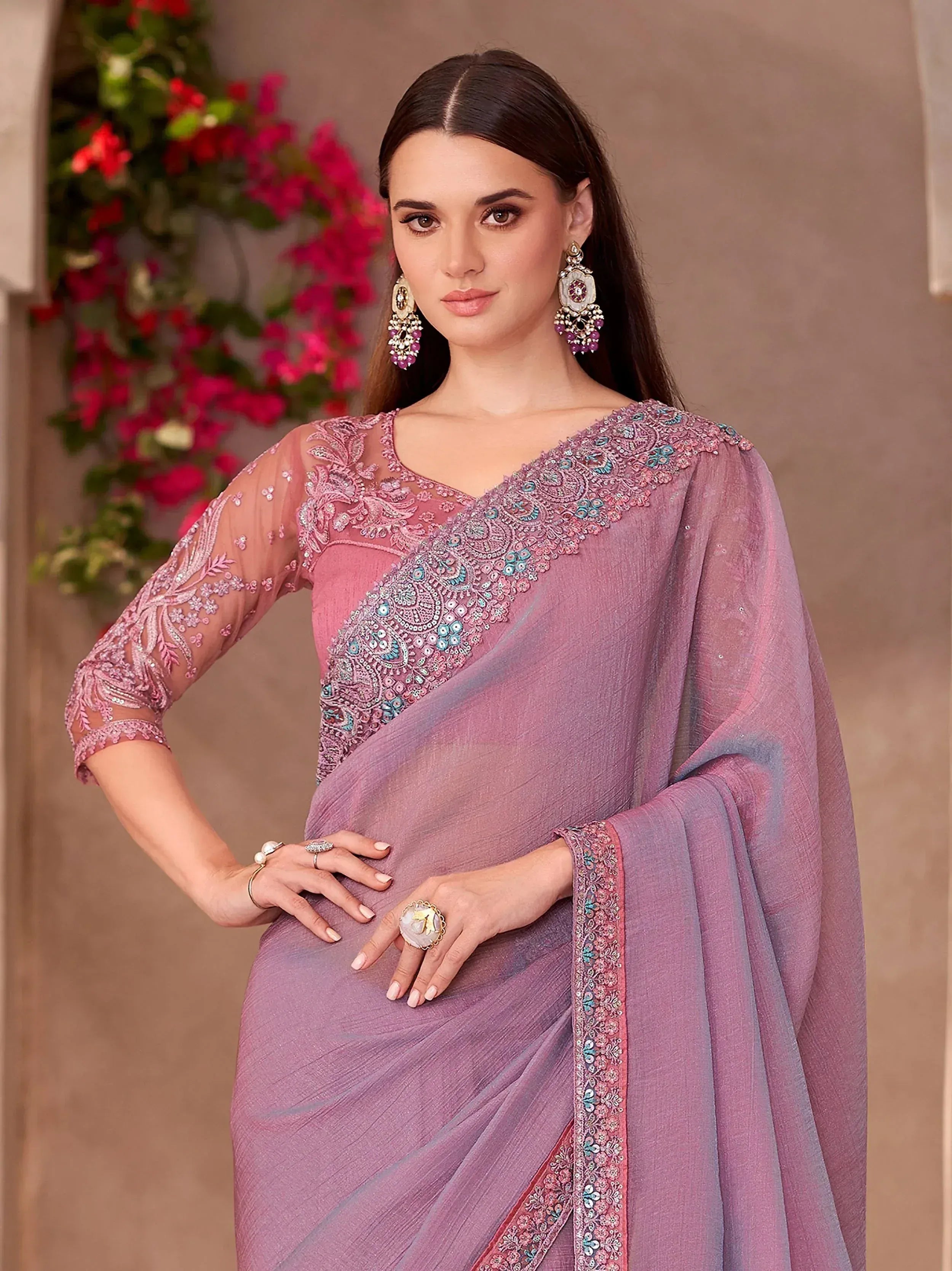 Elegant mauve saree with intricate embroidery and sheer sleeves, perfect for Indian ethnic occasions