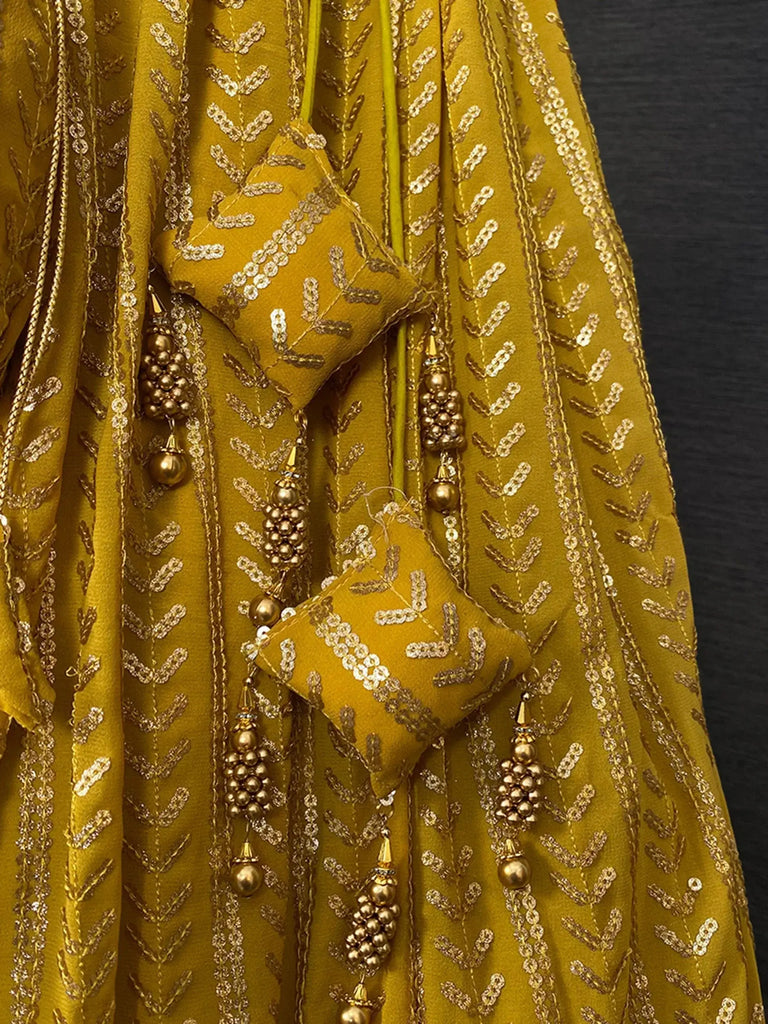 Glamorous Yellow Sequins Embroidered Georgette Party Wear Lehenga Choli