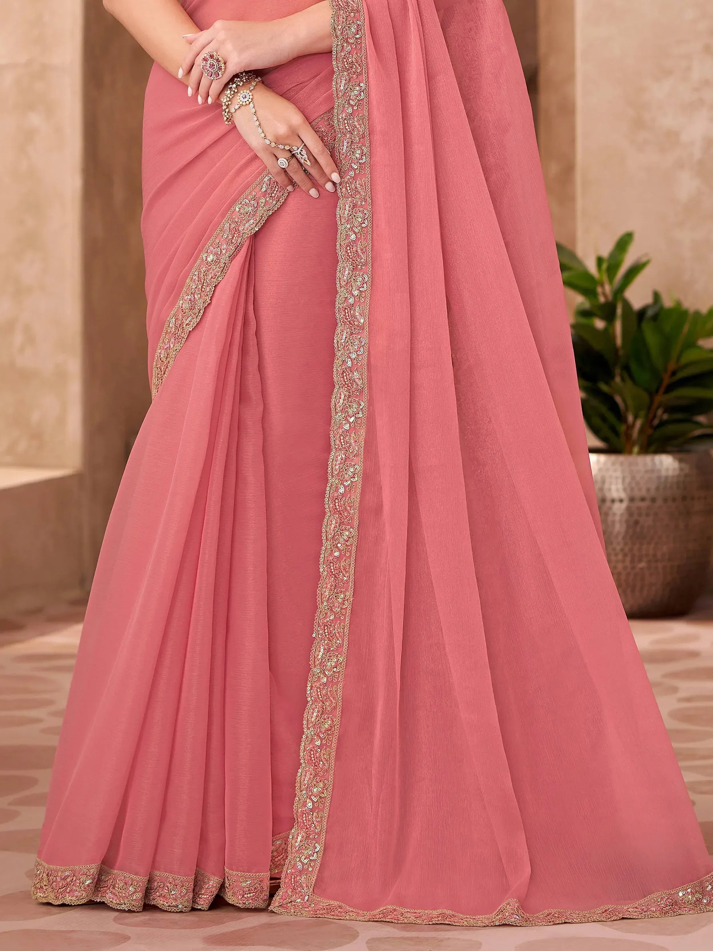 Pink saree with gold embroidery, perfect for Indian ethnic wear occasions