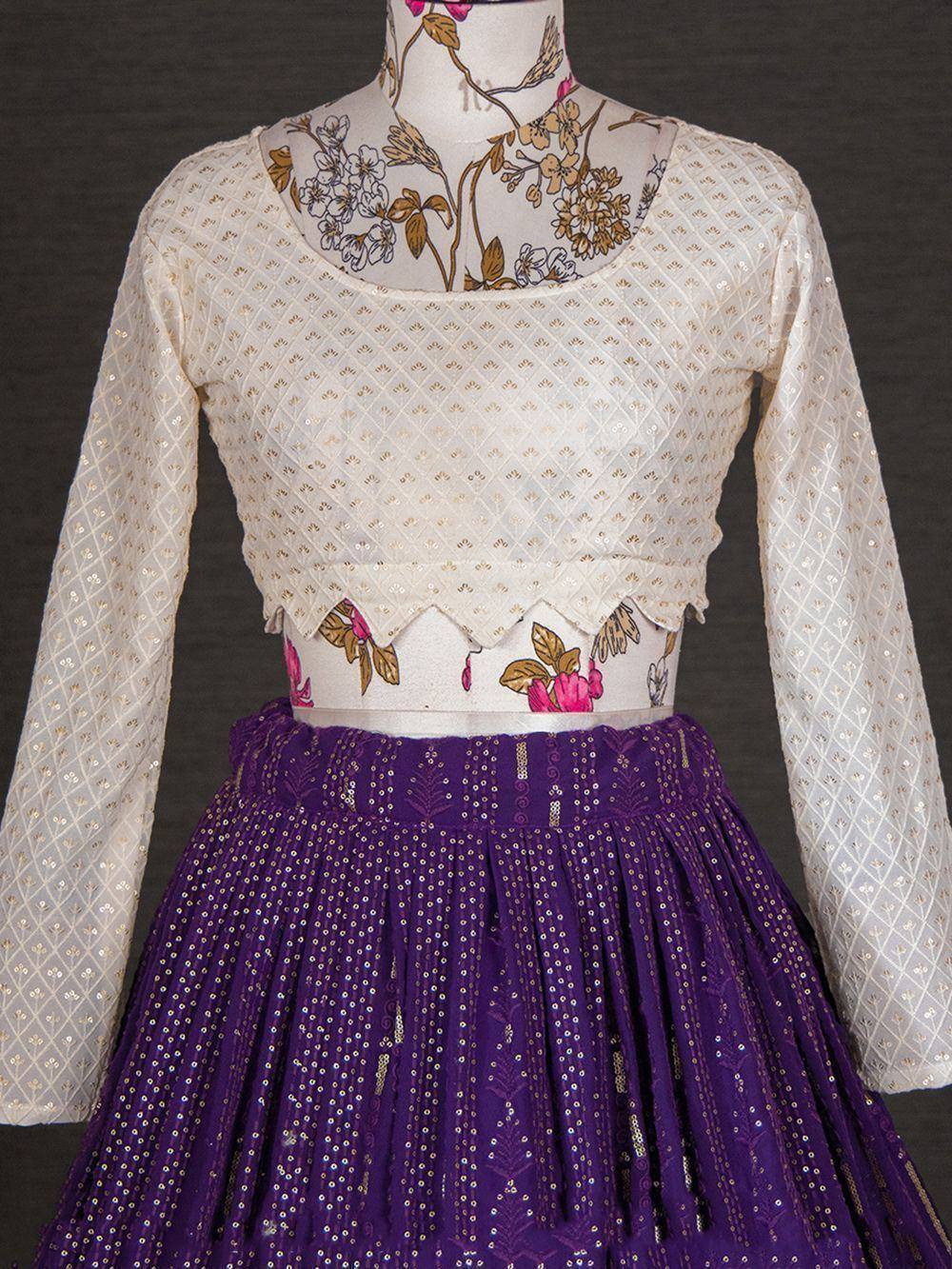 White floral blouse with gold embroidery paired with purple sequin lehenga skirt, ethnic Indian wear